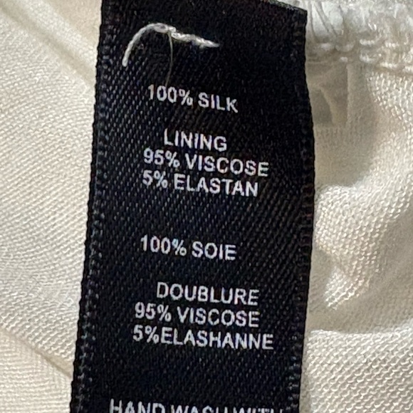 White silk made in Italy blouse. 3D flowers at v neckline. Ruffle front. - Picture 12 of 15